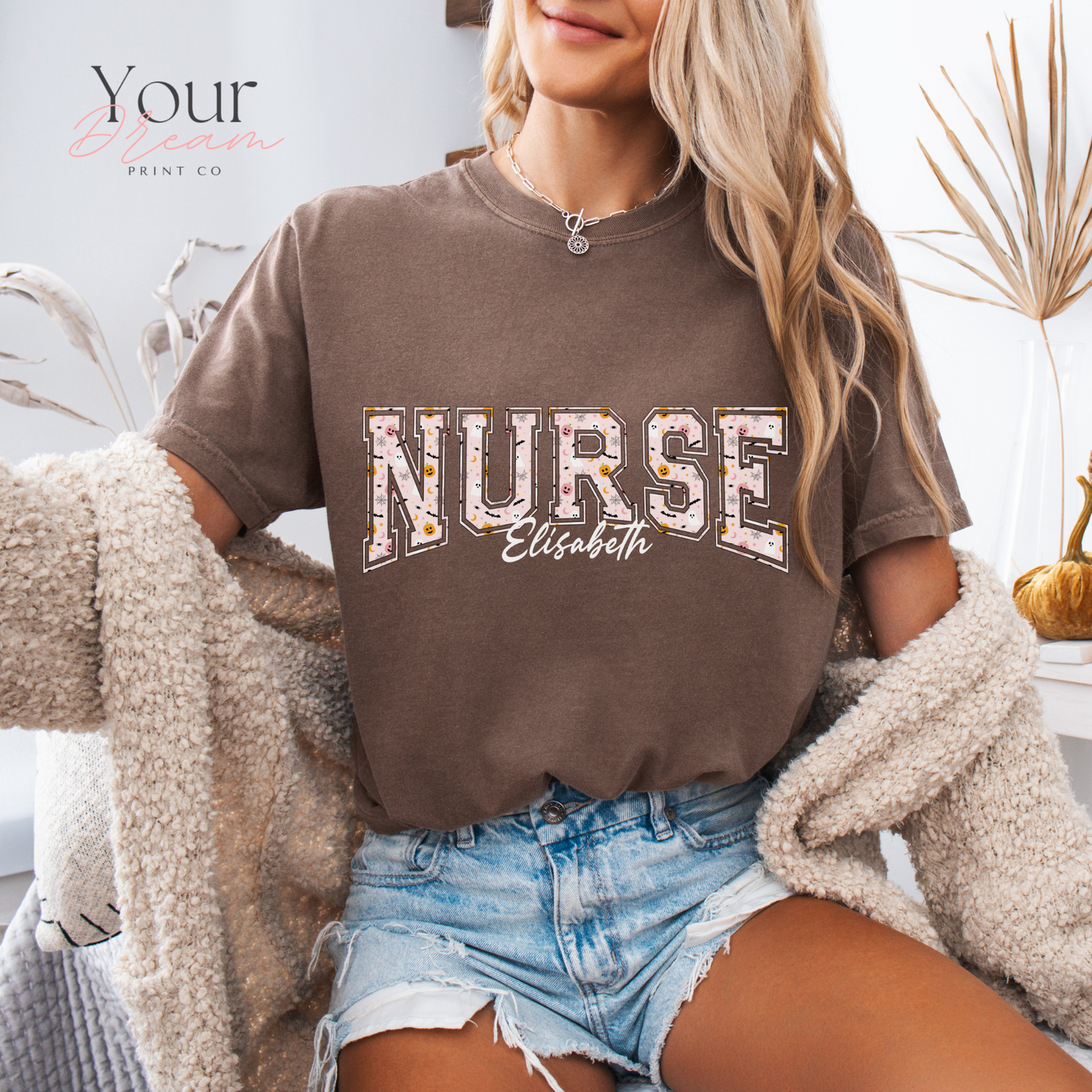 Custom Nurse Halloween T-Shirt – Varsity Lettering with Ghosts & Pumpkins Print