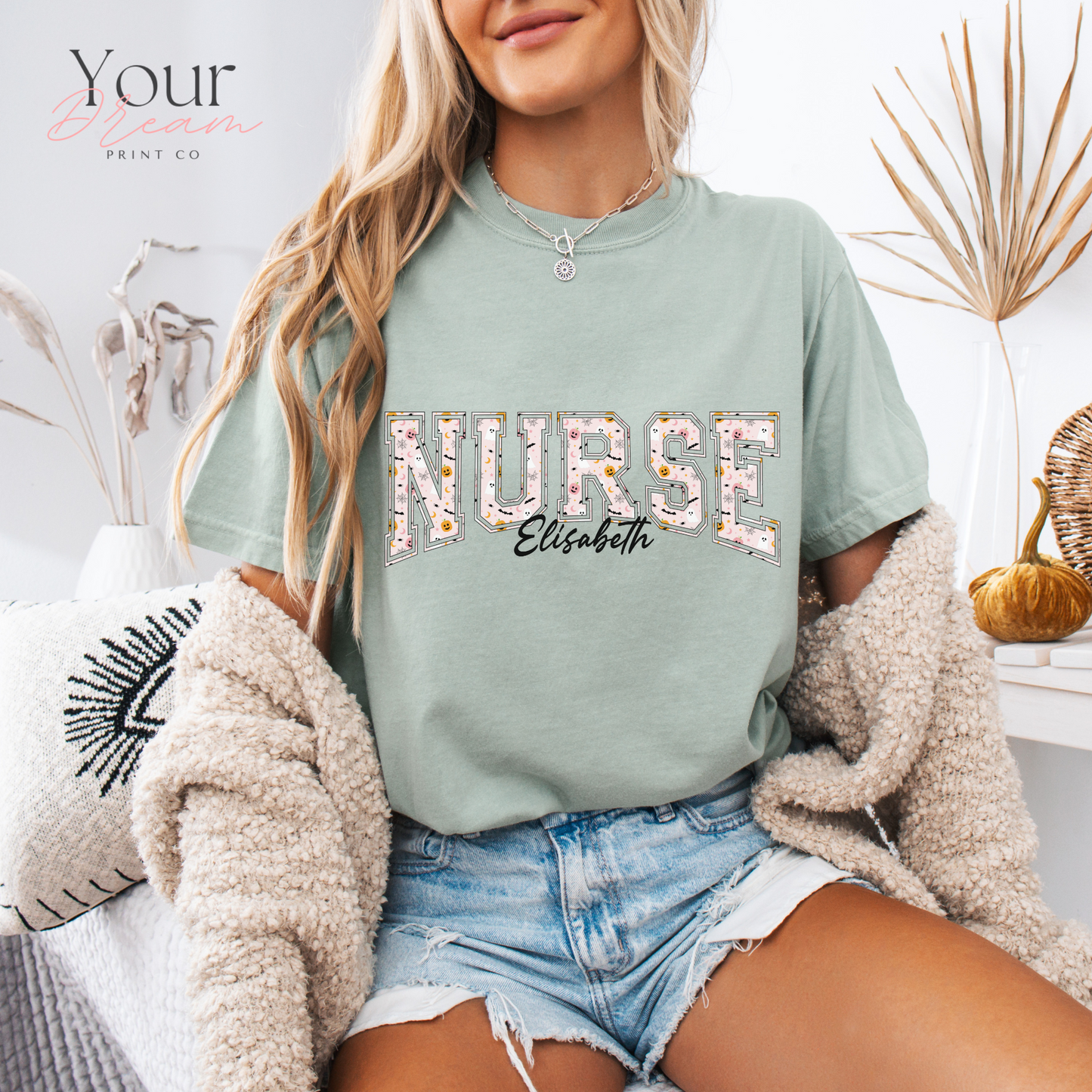 Custom Nurse Halloween T-Shirt – Varsity Lettering with Ghosts & Pumpkins Print