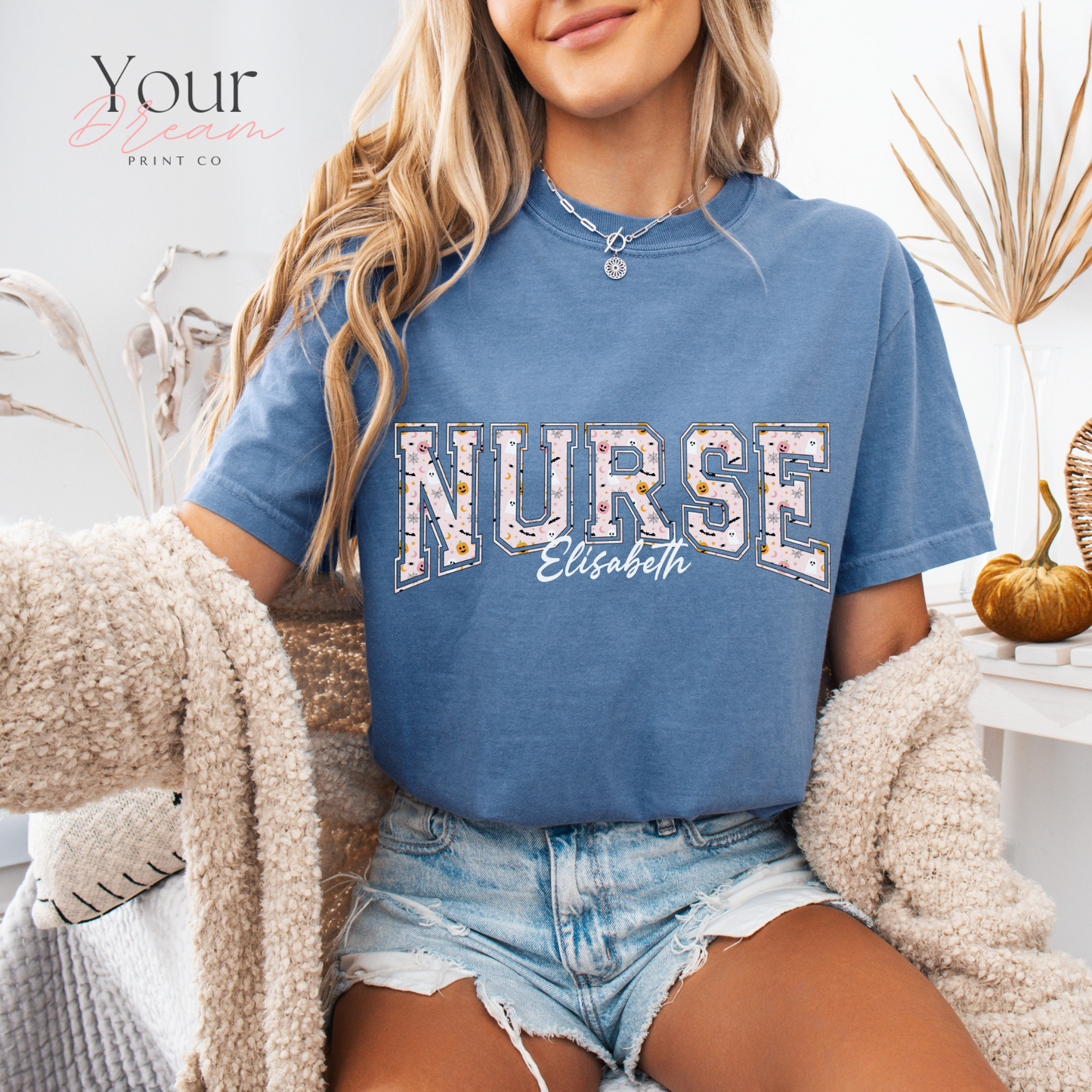 Custom Nurse Halloween T-Shirt – Varsity Lettering with Ghosts & Pumpkins Print