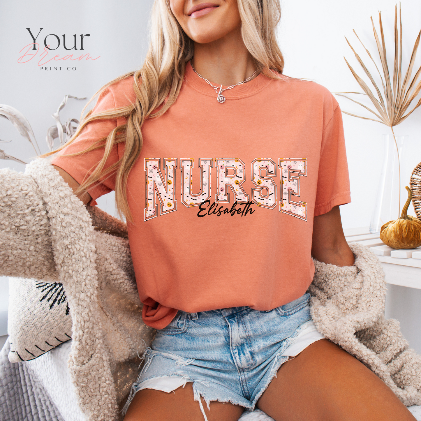 Custom Nurse Halloween T-Shirt – Varsity Lettering with Ghosts & Pumpkins Print