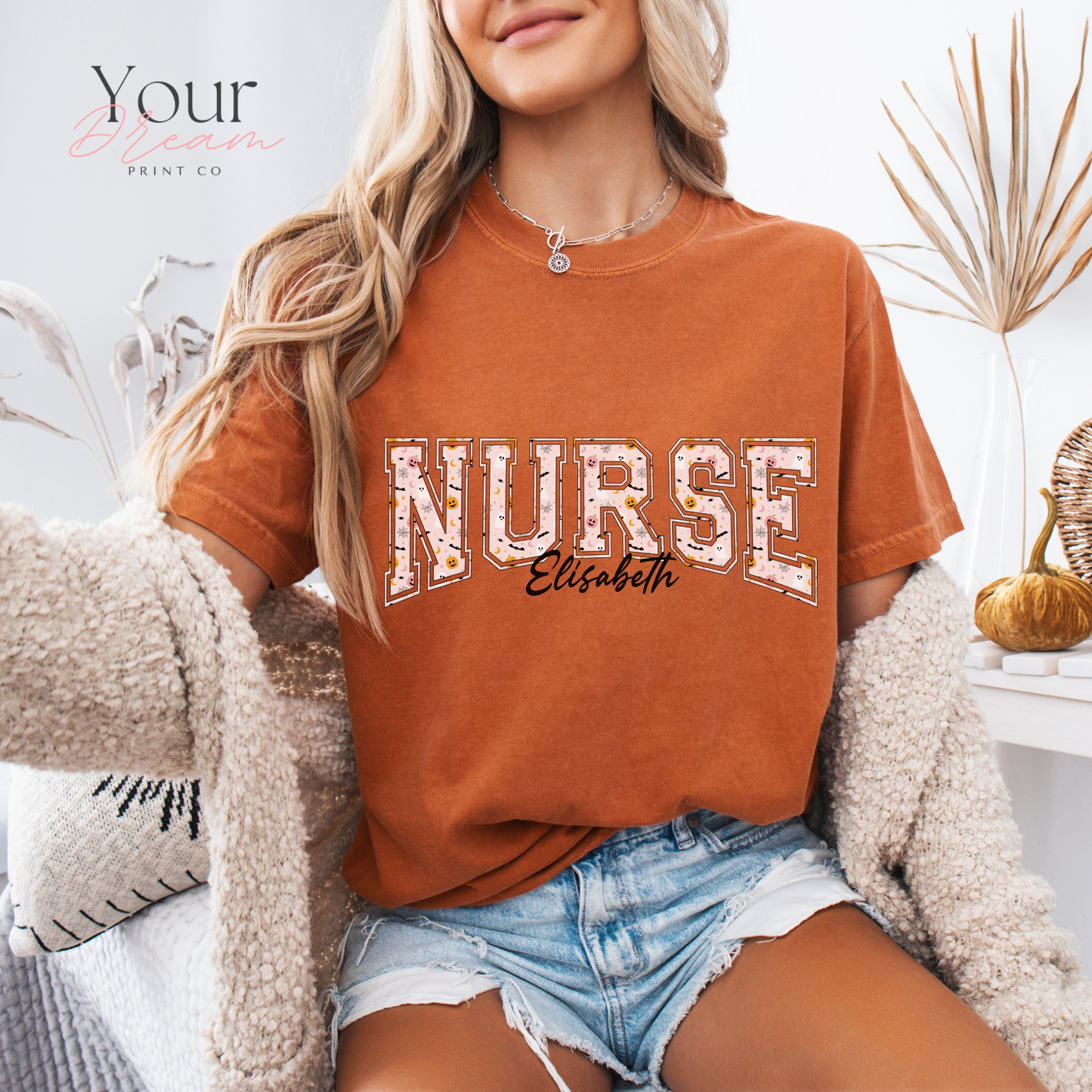 Custom Nurse Halloween T-Shirt – Varsity Lettering with Ghosts & Pumpkins Print